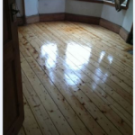 dark room with wooden floor