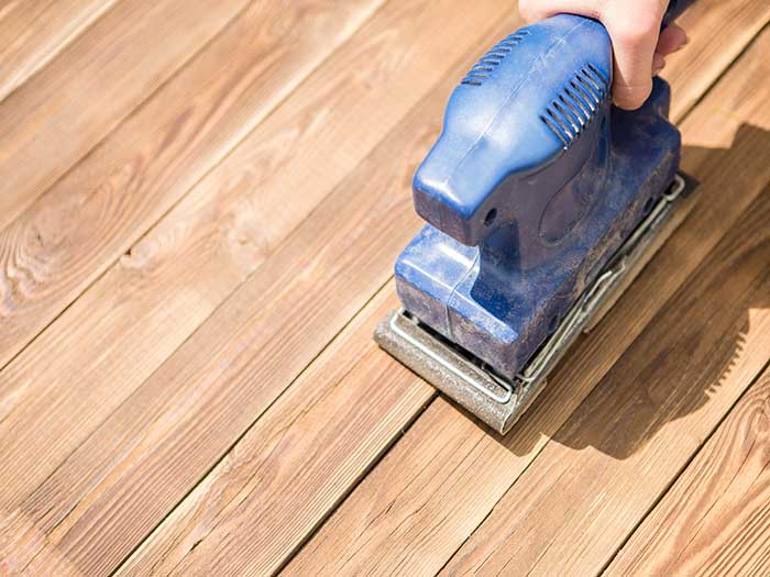 sanding wooden floor